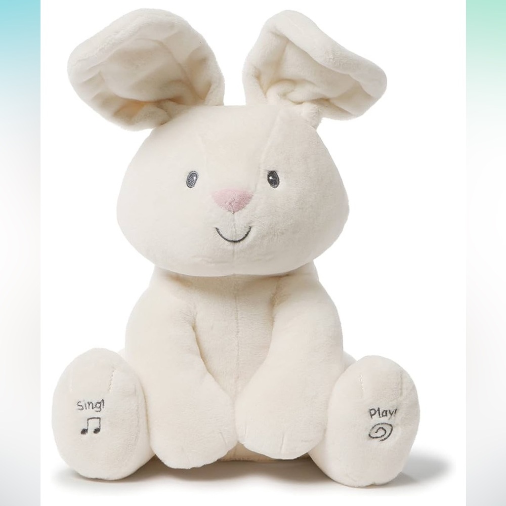 Brand new with tags - Gund - Flora the bunny - sings and ears flap